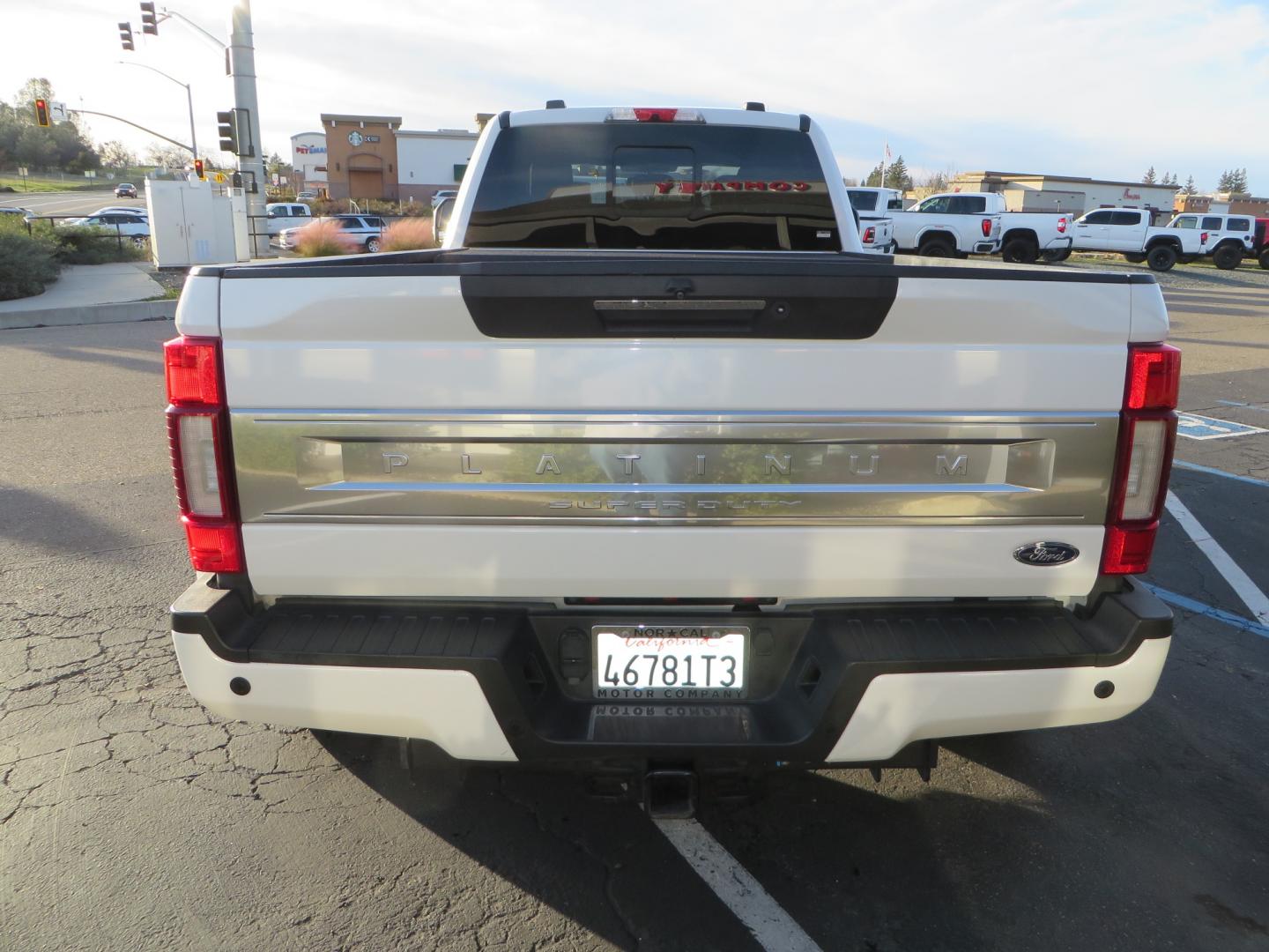 2020 White /BLACK Ford F-450 SD PlatinumCrew Cab DRW 4WD (1FT8W4DT4LE) with an 6.7L V8 OHV 16V DIESEL engine, 6A transmission, located at 2630 Grass Valley Highway, Auburn, CA, 95603, (530) 508-5100, 38.937893, -121.095482 - Must see F450 with a tool box refueling station, window tint, and a center console vault. - Photo#5